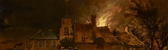 image of A fire in a village at night